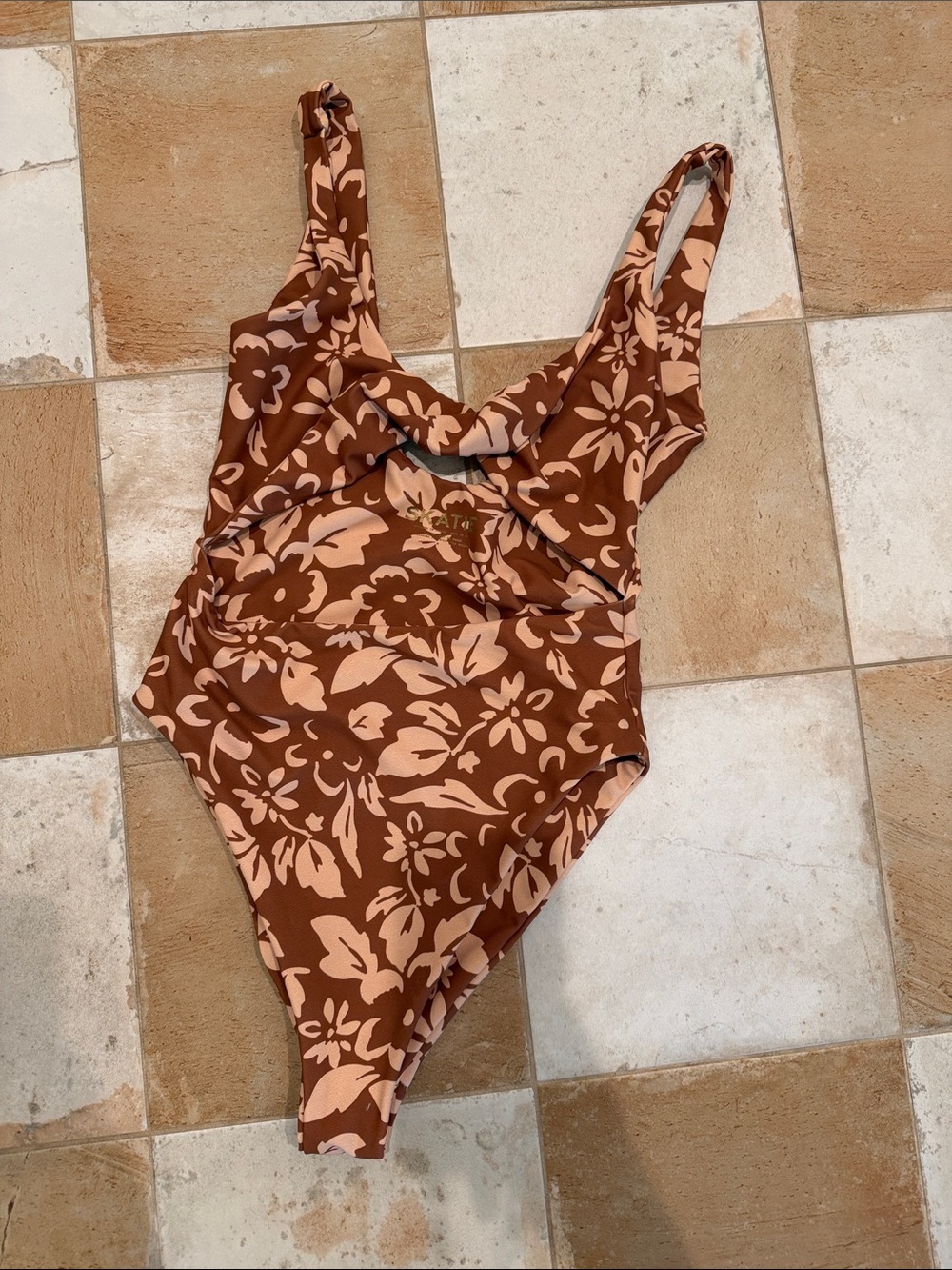 Skatie one piece with cutout